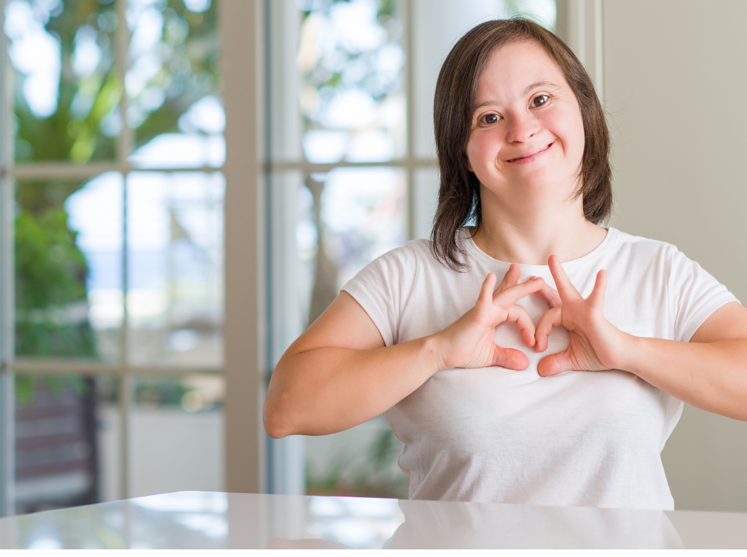 Girl with hand heart