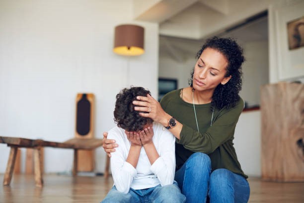 Mother calming son